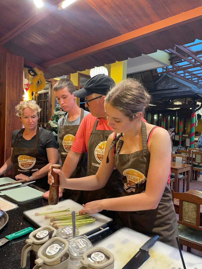 Mastering authentic Bun Bo Hue and Imperial dumplings during a professional hands-on cooking workshop. Learn the secrets of Hue’s royal palate with expert culinary guidance at Madam Thu Restaurant.