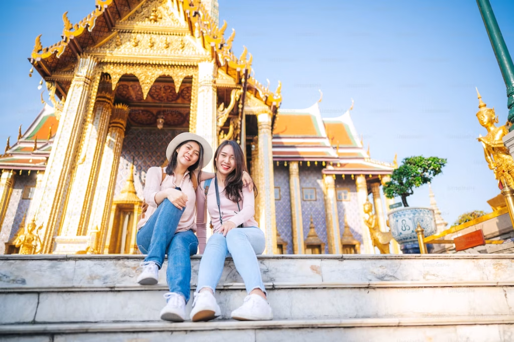 Happy cruise tourists exploring Wat Phra Kaew temple in Bangkok with Vietnam Shore Excursions Happy cruise tourists exploring Wat Phra Kaew temple in Bangkok with Vietnam Shore Excursions
