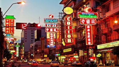 Authentic Isan street food and vibrant Chinatown Yaowarat night scene on private Bangkok food tour