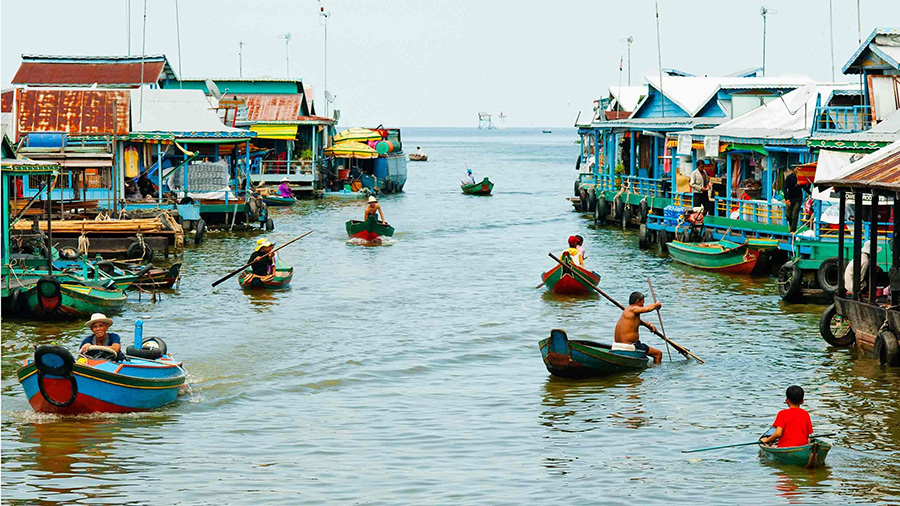 Experience life on Tonle Sap Lake, Cambodia’s vast and vibrant freshwater sea. Tonle Sap Lake, Cambodia: Floating community seen during a Vietnam and Cambodia tour.