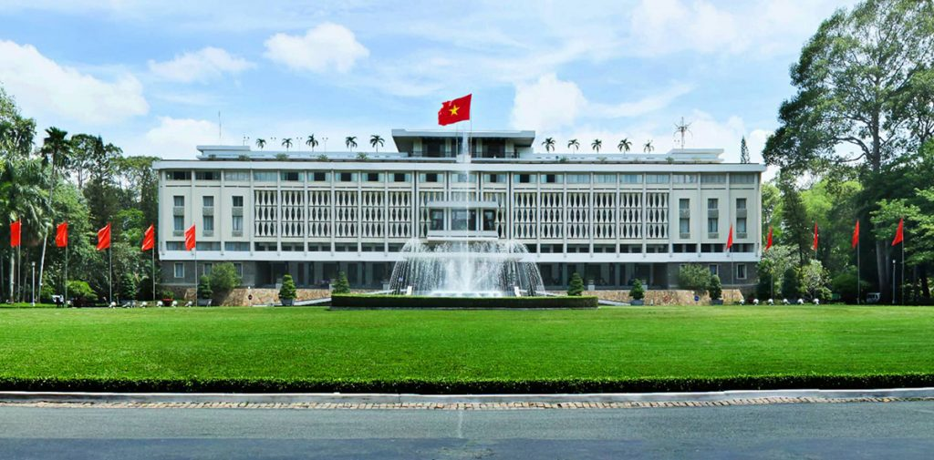 Reunification Palace, HCMC: Iconic history and architectural landmark. Reunification Palace, Vietnam: A key landmark visited on a Vietnam and Cambodia tour.