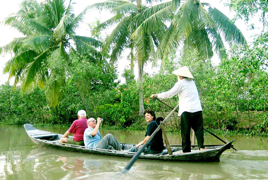 Mekong Delta boat ride: Discovering vibrant local life along the winding waterways. Mekong Delta boat ride: Discovering vibrant local life along the winding waterways on grand tour vietnam 19 days.