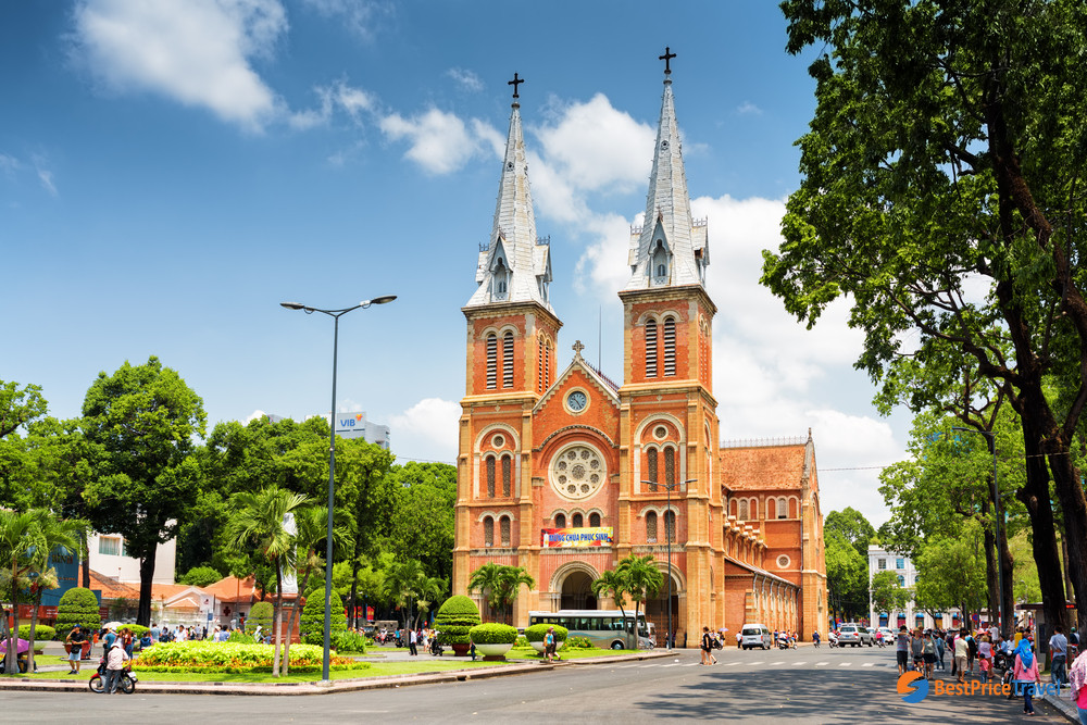 The magnificent Notre Dame Cathedral stands as an iconic symbol of French colonial heritage in the heart of Ho Chi Minh City (Saigon) The Notre Dame Cathedral, a large red-brick church with two bell towers, located in Ho Chi Minh City (Saigon), Vietnam